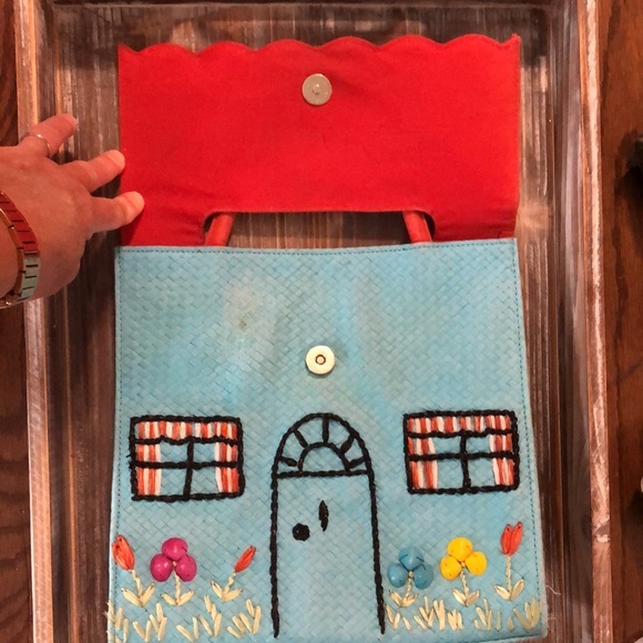 Lulu Guinness
"House" Purse Turquoise and Red Straw Satchel
10"L x 3"W x 10"H - Picture 13 of 15